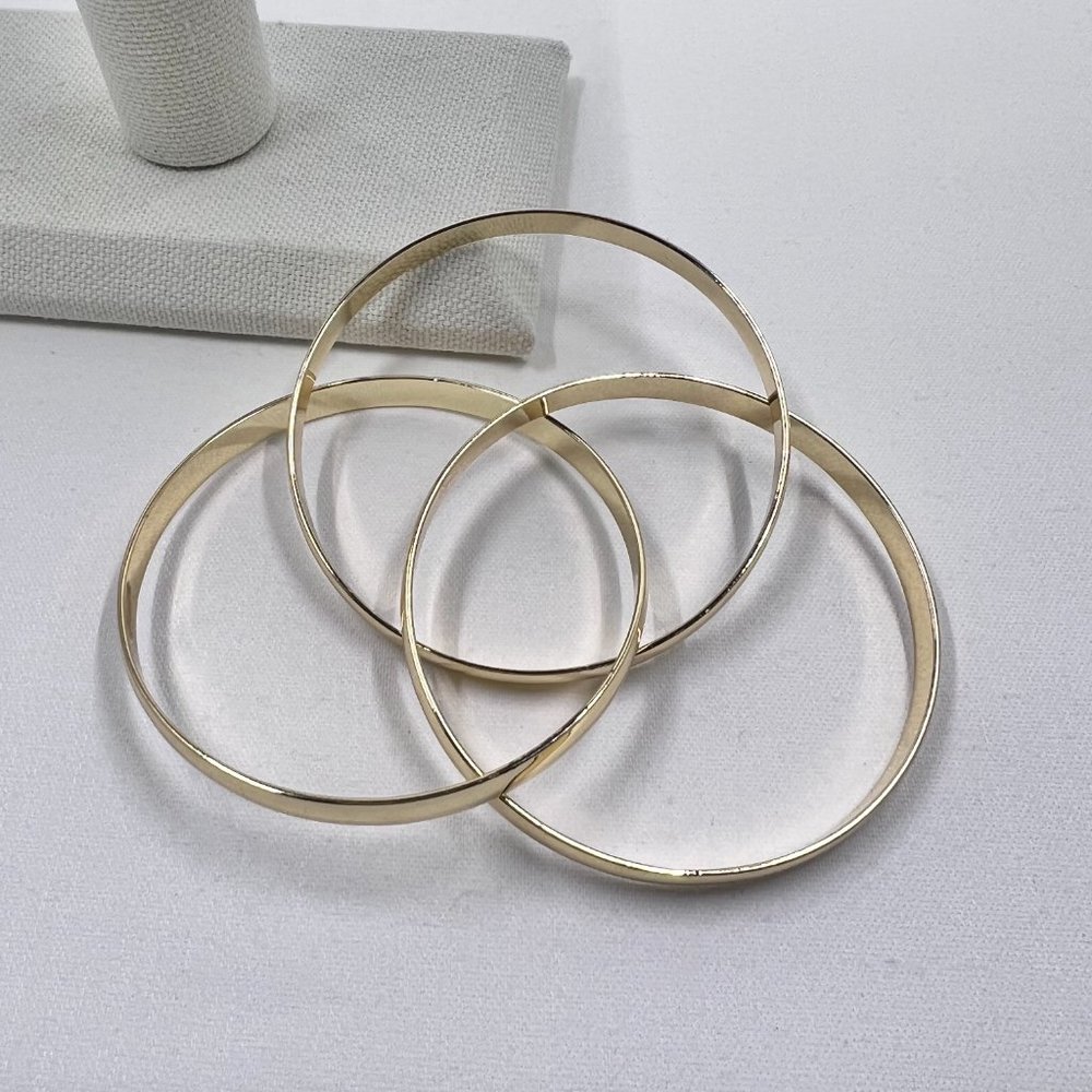 Gold Tone Trinity Interlocking Bangle - Picture 3 of 6